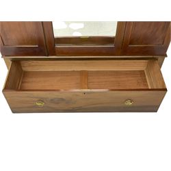 Edwardian inlaid mahogany wardrobe, projecting moulded cornice over central bevelled mirror glazed door, panelled uprights inlaid with trailing bellflowers and foliate decoration, the skirted base fitted with single drawer 