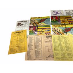 Meccano - toy shop point-of-sale cardboard advertising sign with easel back, depicting a boy finishing a large Eiffel Tower H37cm; nine catalogues 1938/9, 1939/40, 1952, 1953, three x 1956, 1958 and HRCA 1994 copy of 1939/40, bearing various toy shop addresses to front covers, some with price lists; and seven price lists 1949 - 1966.