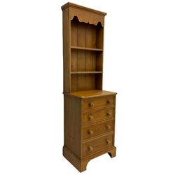 Solid pine dresser, fitted with four drawers and two tier plate rack