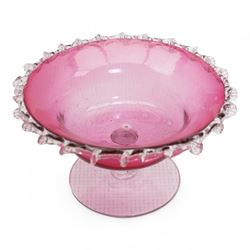 Early 20th century Bohemian cranberry glass flower form plate, overlaid with opaque and hand painted and gilded with a floral bouquet, D19.5cm, pair of cranberry glass pulpit vases, satin glass ewer and two further pieces of cranberry glass (6)