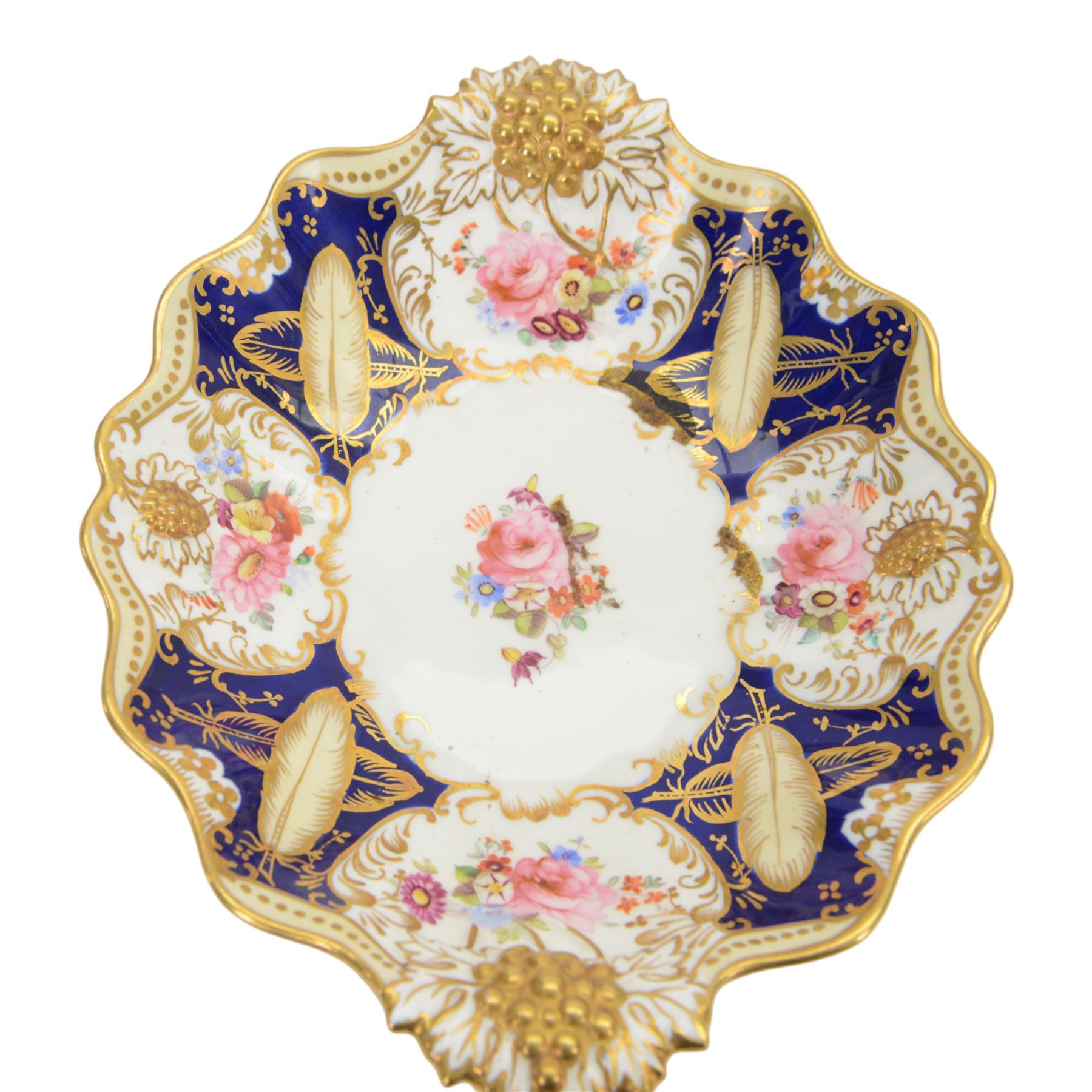 Collection of 19th century porcelain dessert wares, comprising Bloor Derby dish, circa 1825, Spode Felspar shaped oval dish, circa 1820, Ridgeway shaped oval footed dish with twin handles, circa 1840, Ridgeway dish, circa 1820, and tazza and dish, probably Minton, pattern 4810, each decorated in various patterns with floral sprays against dark blue grounds and heightened with gilt