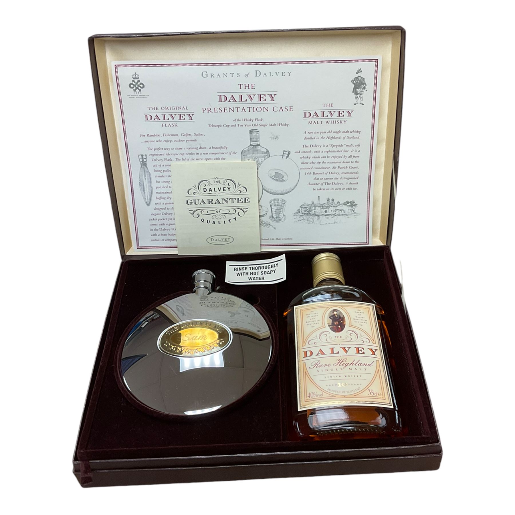 Dalvey whisky presentation set, comprising Dalvey, 10 year old, Highland single malt whisky, 35cl, 40% vol, together with a whisky flask of circular form, in fitted presentation case
