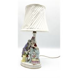 Sitzendorf table lamp modelled as a male and female figure, with white fabric shade