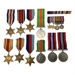 Ten WW2 medals comprising two 1939-1945 war medals, two Defence medals, two 1939-1945 Stars, two Africa Stars, France & Germany Star and Burma Star; together with bar of four miniature medals; all with ribbons