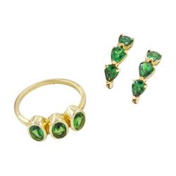 Gold tsavorite garnet ring and a pair of gold tsavorite garnet hoop earrings, both hallmarked 9ct