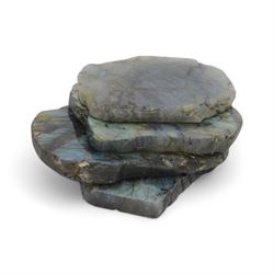 Four polished labradorite coasters with raw edges, approximate D8cm
