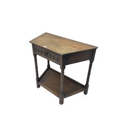 Oak side table, canted rectangular form fitted with single drawer with arcade front, on turned supports joined by undertier 