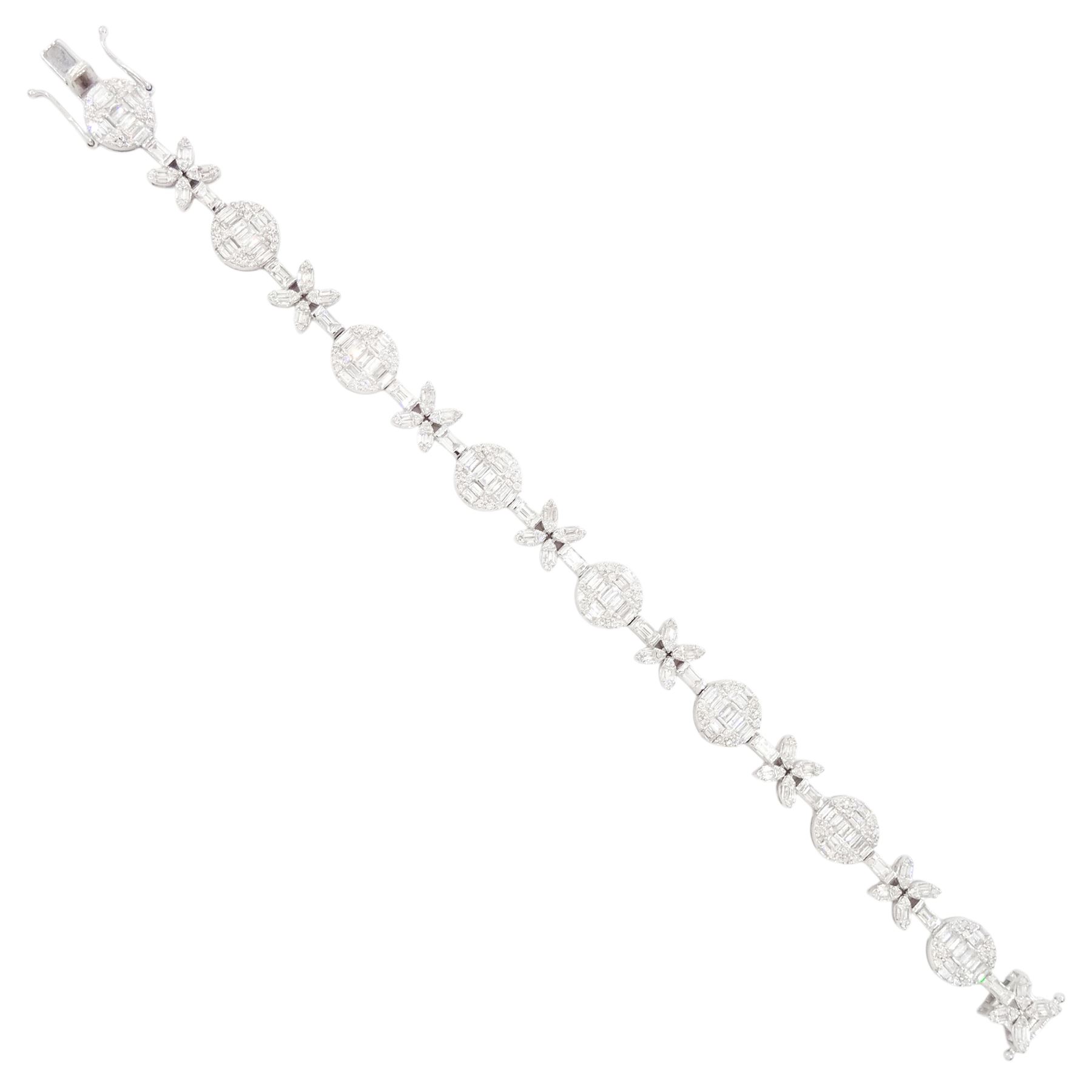 18ct white gold diamond bracelet, eight circular, pave set round brilliant cut and baguette cut diamond clusters, spaced by a single baguette cut diamond and a diamond flower head design cluster, stamped 750, total diamond weight approx 3.70 carat