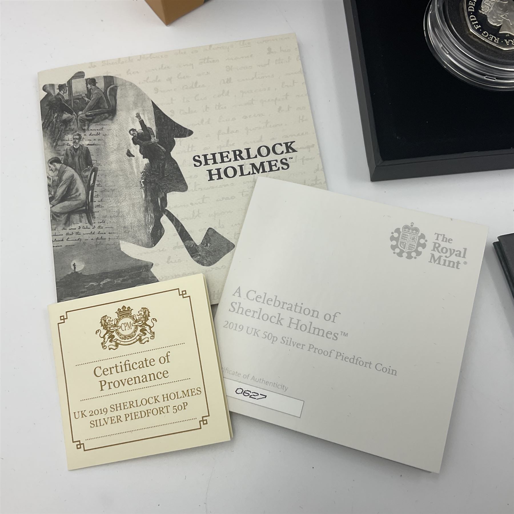 Three The Royal Mint United Kingdom silver proof piedfort fifty pence coins, comprising 2017 'Sir Isaac Newton', 2019 'A Celebration of Sherlock Holmes' and 'Celebrating the Life of Stephen Hawking', all cased with certificates 