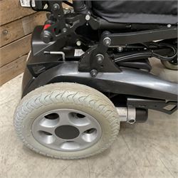 Permobil LSA Lifestand seated and standing wheelchair