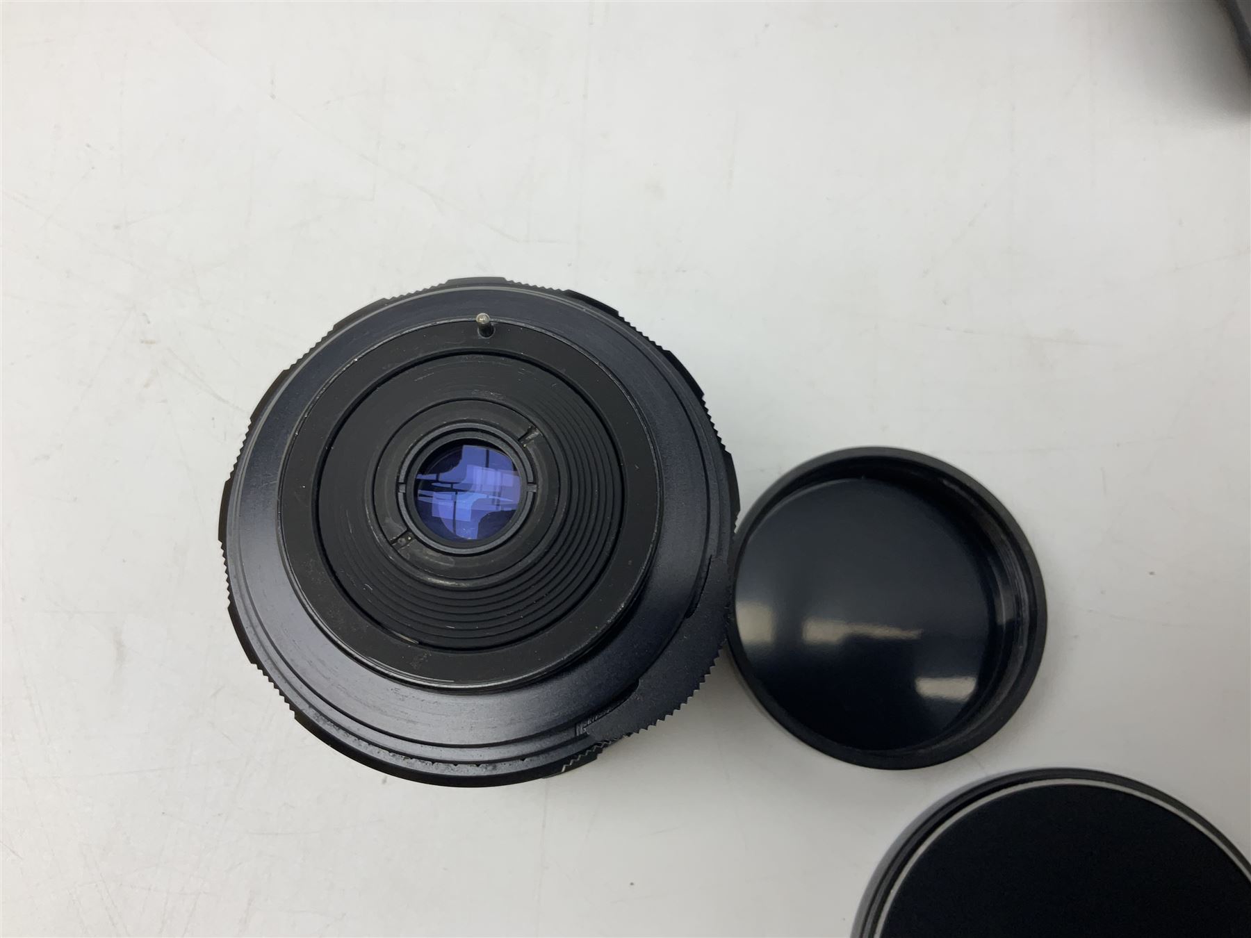 Asahi Pentax S1a camera body, serial no. 707071, with 'Super-Takumar 1:1.8/55' lens, serial no 2124044, together with Asahi Pentax Sv camera body, no. 1925617 with 'Super-Takumar 1:2/55' lens, serial no. 2770153, Asahi Pentax Meter, 'Super-Takumar 1:3.5/28' lens, serial no. 2075492 and 'Super-Takumar 1:4/150' lens, serial no. 1461613  