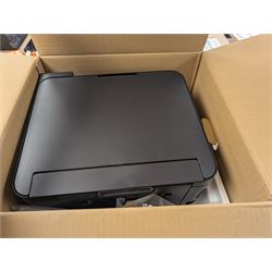 Epson ET-2750 ecotank printer, boxed with a collection of printing paper including photographic paper and postcards