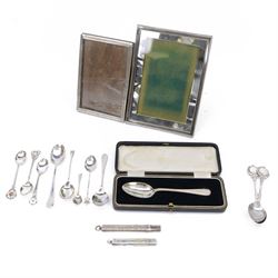 Group of silver, comprising two rectangular photograph frames, two pencil holders, boxed spoon and souvenir spoons, all hallmarked 
