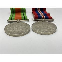 WW1 pair of medals awarded to 151761 Gnr. S. Loten R.A. with ribbons; four WW2 medals with ribbons; and small quantity of cap badges, medallions etc