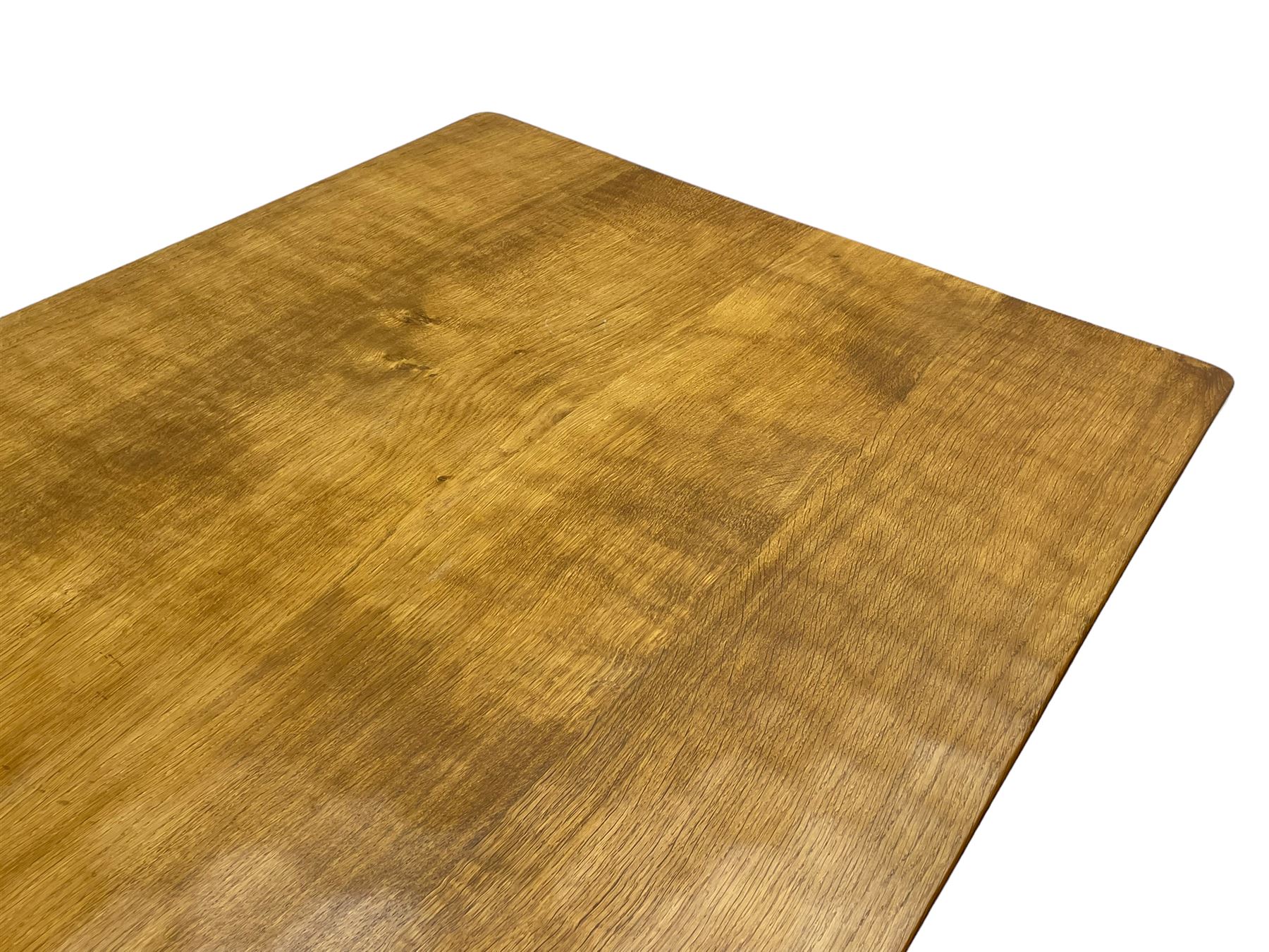Mouseman - oak dining table, adzed rectangular top on twin octagonal pillar supports, sledge feet united by floor stretcher, by the workshop of Robert Thompson, Kilburn 