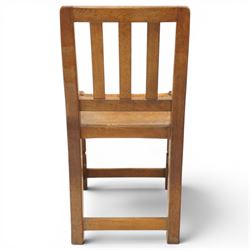 Mouseman - 1940s oak side chair, the slat-back over a slung leather seat, raised on octagonal front supports united by box stretcher, carved with slim mouse signature, by the workshop of Robert Thompson of Kilburn