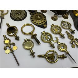 Collection of 20th century horse brasses and heavy horse decorations, including loose, leather mounted and wooden mounted examples