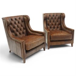 Timothy Oulton - pair of wingback armchairs upholstered in back-buttoned chocolate brown l...