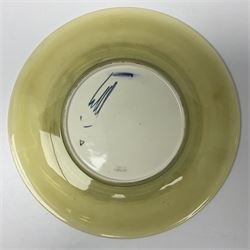 Moorcroft Tiger Lily pattern plate on a yellow ground, with painted and impressed mark beneath, D26cm