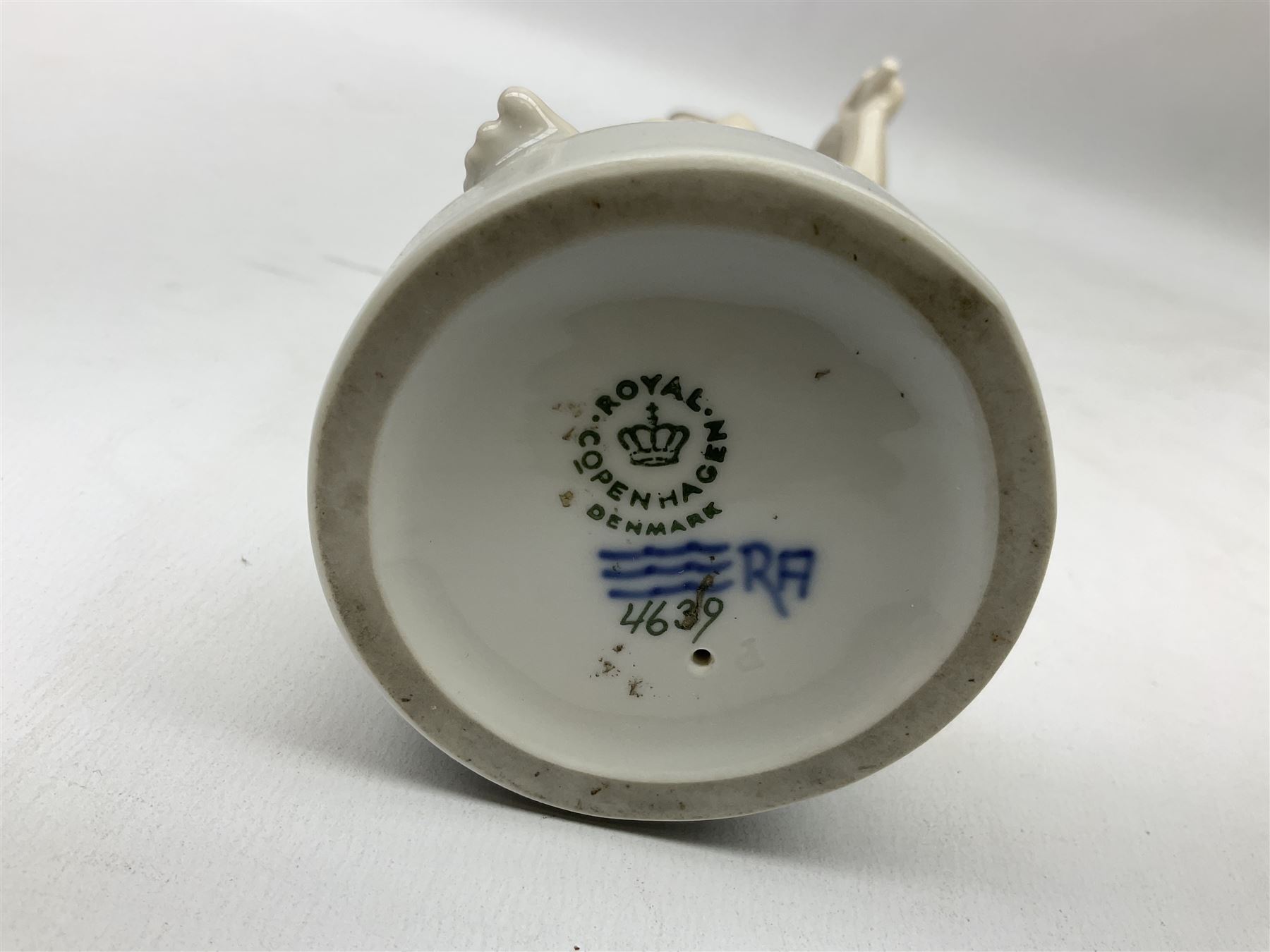 Royal Copenhagen 'Helena' figure modelled as a nude girl holding hand mirror, designed by Hans Hansen, model no. 4639, with printed and painted marks beneath, H25.5cm