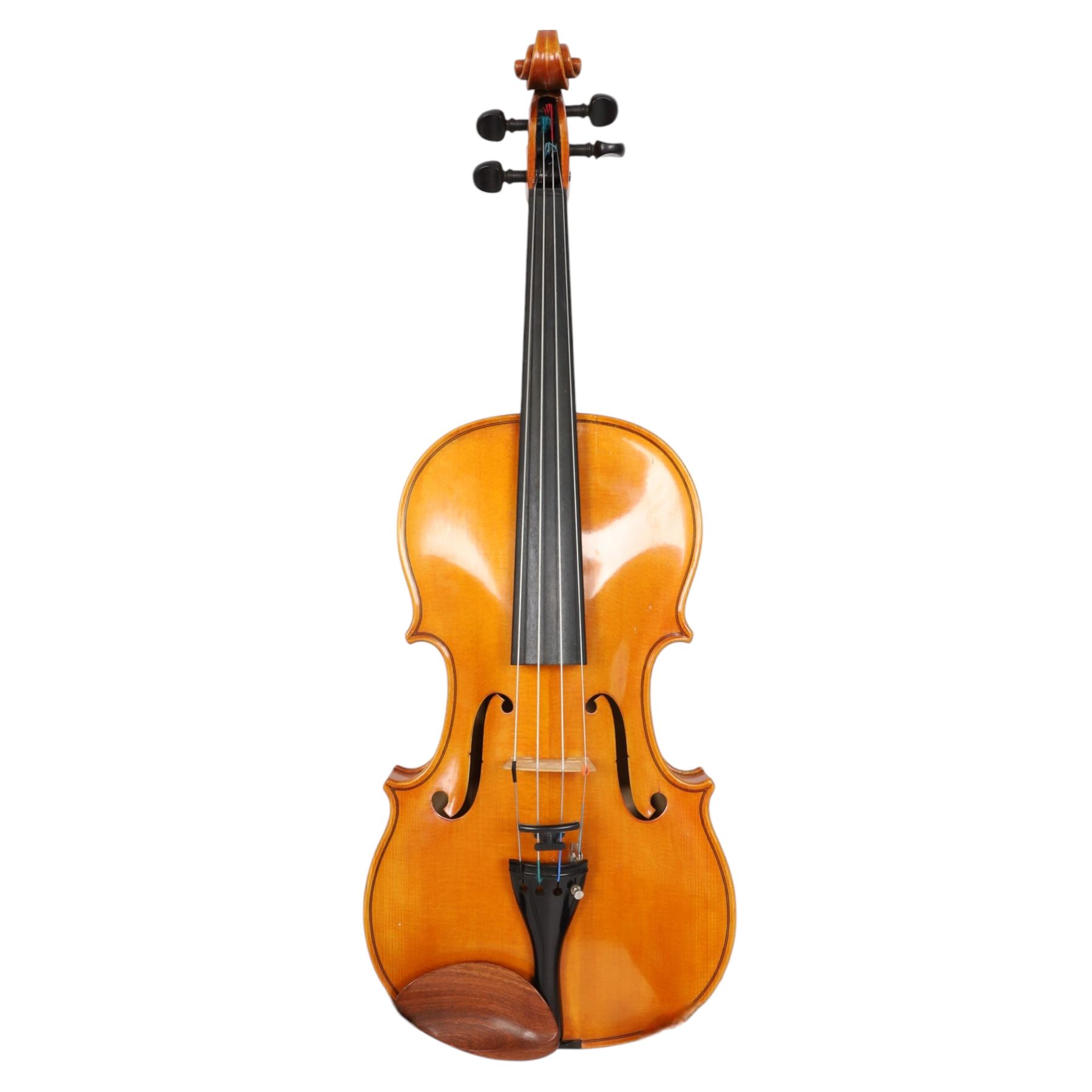 Late 20th century German full size viola, labelled to interior 'Walter Muller Bad Brambach 1976 made in GDR' with two-piece back, ebonised finger board, tuning pegs and tail piece, with a carved scroll and two bows, in hard fitted case, back length 16 inches