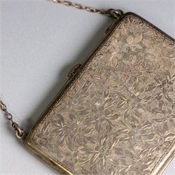Early 20th century silver coin purse, with floral decoration and finger chain, hallmarked together with an early 20th century cigarette case,  with engraved initials, hallmarked and a silver filigree cigarette case