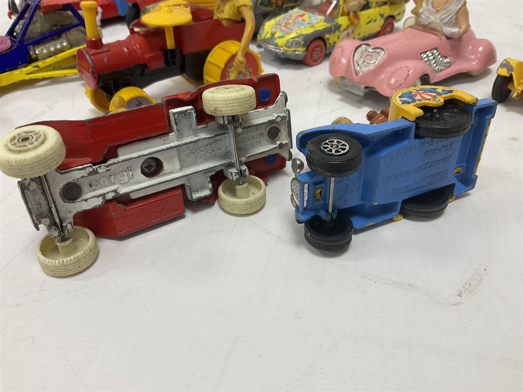 Corgi - ten unboxed and playworn TV/Film related die-cast models including three Popeye Paddle Wagons; Dick Dastardly; Magic Roundabout; Muppets; Batman Penguinmobile; and Basil Brush (10)