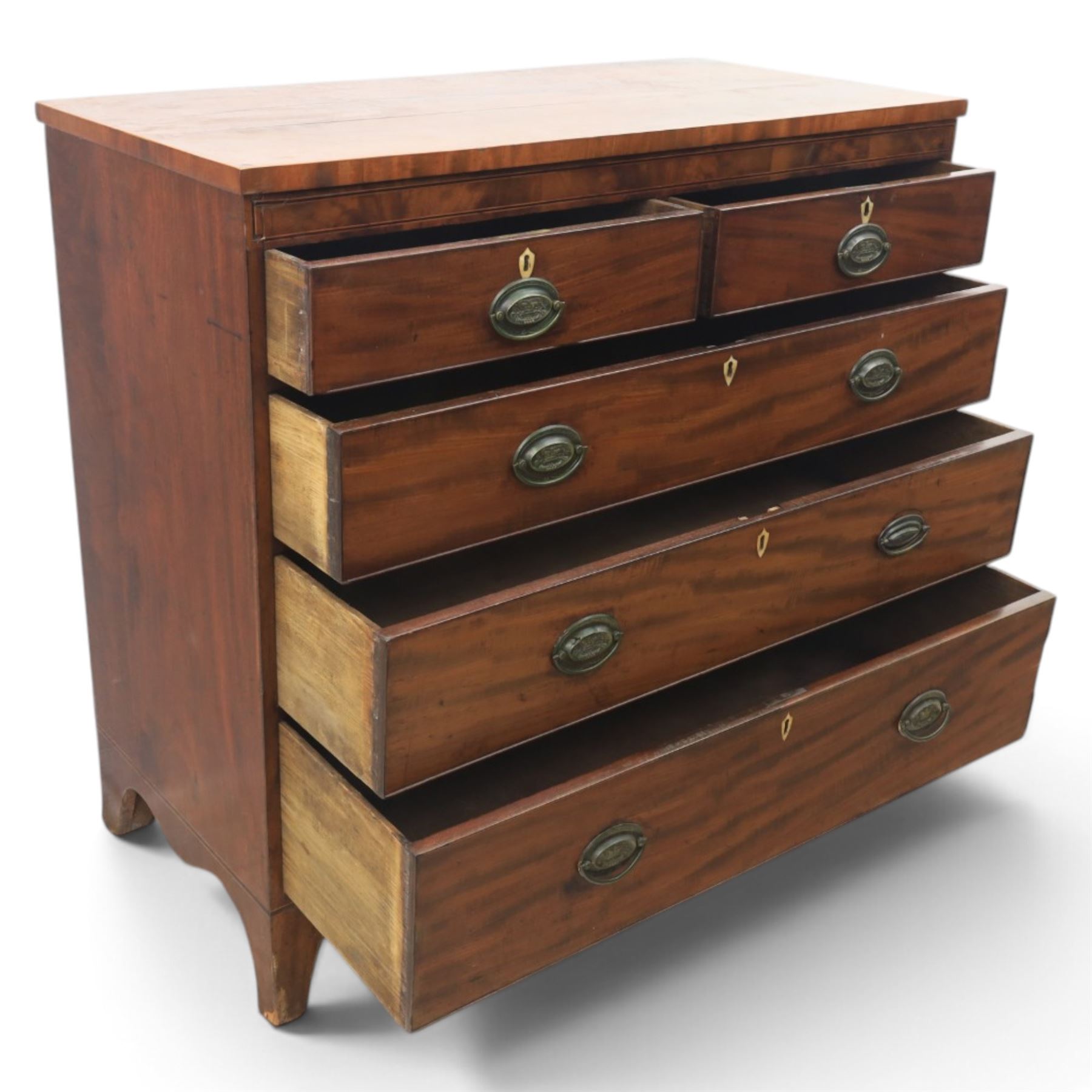 19th century mahogany chest, two short over three long drawers with brass handles, raised on shaped feet