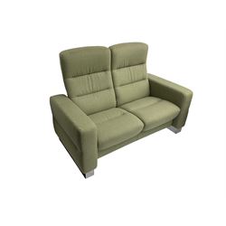 Ekornes Stressless - three seat reclining sofa upholstered in pale green fabric (198cm x 82cm x 100cm), Ekornes Stressless - matching two seat reclining sofa (144cm x 82cm x 100cm), Ekornes Stressless - storage ottoman with hinged seat upholstered in pale green fabric (60cm x 60cm x 42cm)