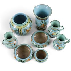 Hartrox Stoneware comprising three jugs, two vases and three bowls, all with green, blue and yellow floral decoration, with printed marks beneath, tallest H20cm