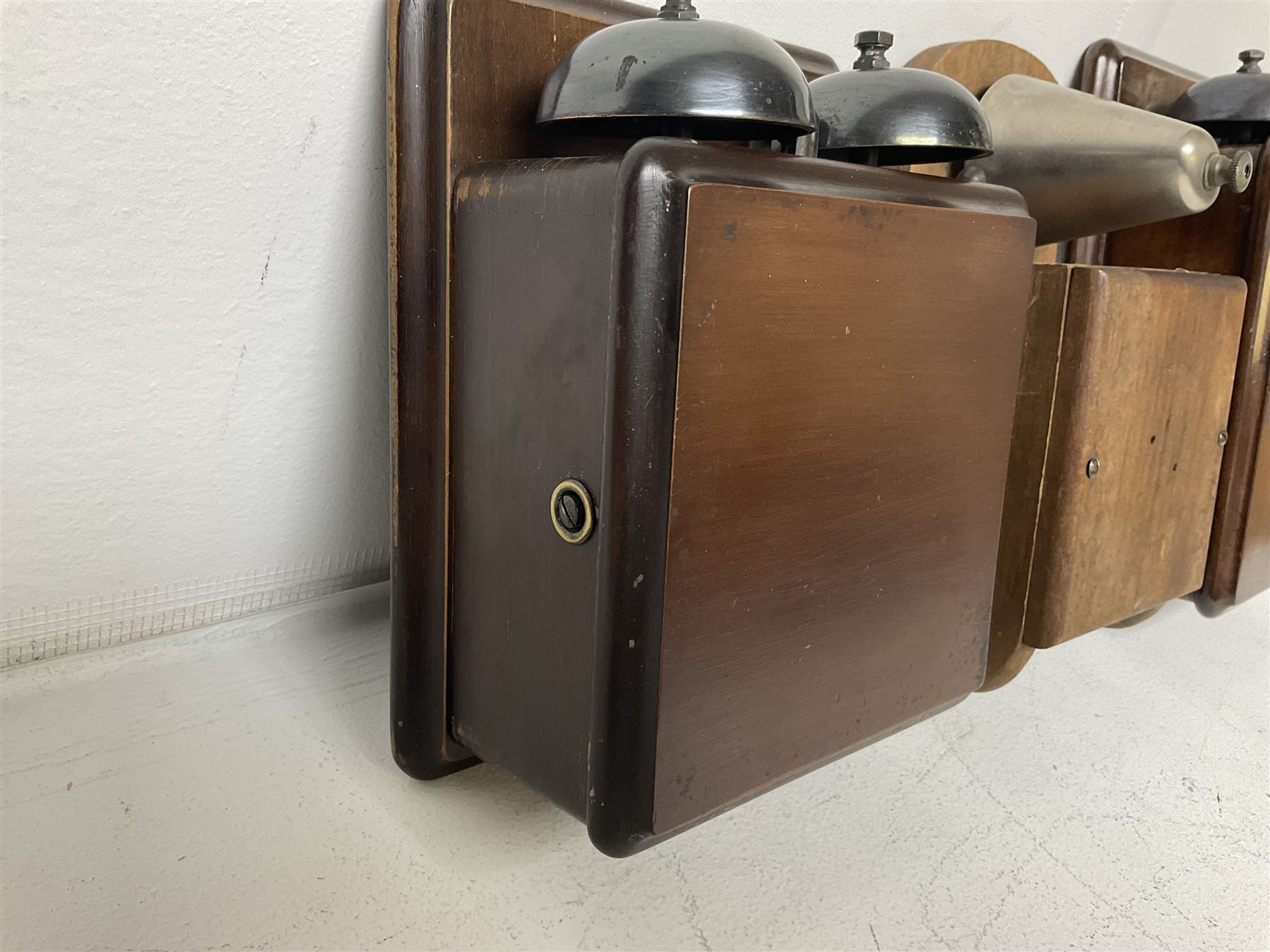 Two GPO wall mounted bell boxes, the first example marked no.1, and no.1A, together with three other wall mounted bell boxes 
