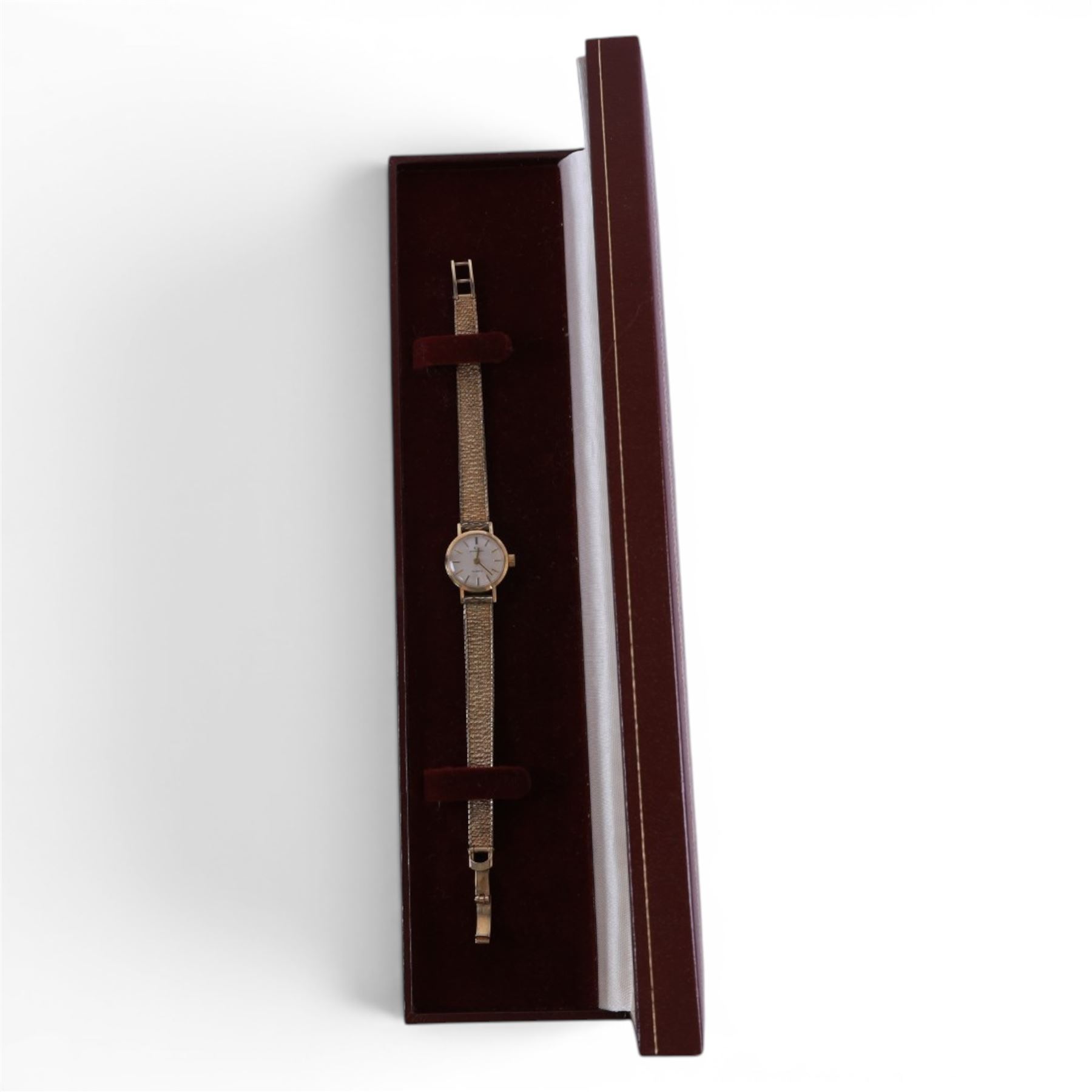 Garrard ladies 9ct gold quartz presentation wristwatch, on integral 9ct gold bracelet, hallmarked