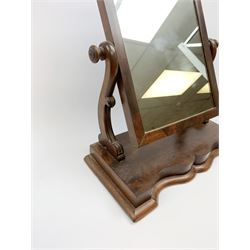 A Victorian mahogany toilet mirror, with curved supports, overall H59cm. 