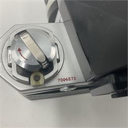 Nikon photomic Ftn camera body, with red engraving, serial no 7006572, circa 1969, with 'Nikon NIKKOR-O Auto 1:2 f=35mm' lens, serial no. 830478