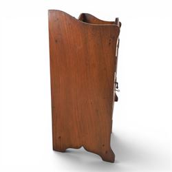 19th century oak table top smokers cabinet, with carved foliate pediment, the two beveled edge glass doors opening to reveal a fitted interior, with four drawers and fitted brass of pipe holders to each door, H46cm