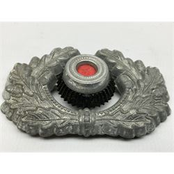 Five WW2 German peaked cap badges, four with double-pinned backs