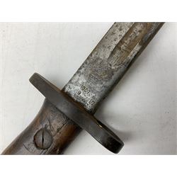 British Pattern 1907 bayonet with 43.5cm fullered steel blade; in leather scabbard with webbing frog L58cm overall; another Pattern 1907 bayonet lacking scabbard; and British Pattern 1888 Mk.I bayonet by Wilkinson London (no scabbard) (3)