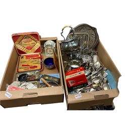 Quantity of silver-plated and other metalware to include cutlery, Eska miniature brass cased clock, Aynsley Portlandware clock, boxed View-master, hat pins, costume jewellery and other misc etc in two boxes