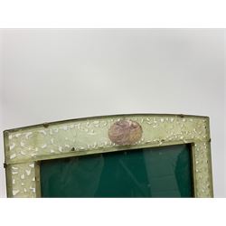Early 20th century Chinese jade mounted photograph frame, of rectangular form the pierced jade frame carved with flowers and birds, the top panel carved with Foo dogs flaking an applied carved lavender coloured boss, with easel support verso, H33cm
