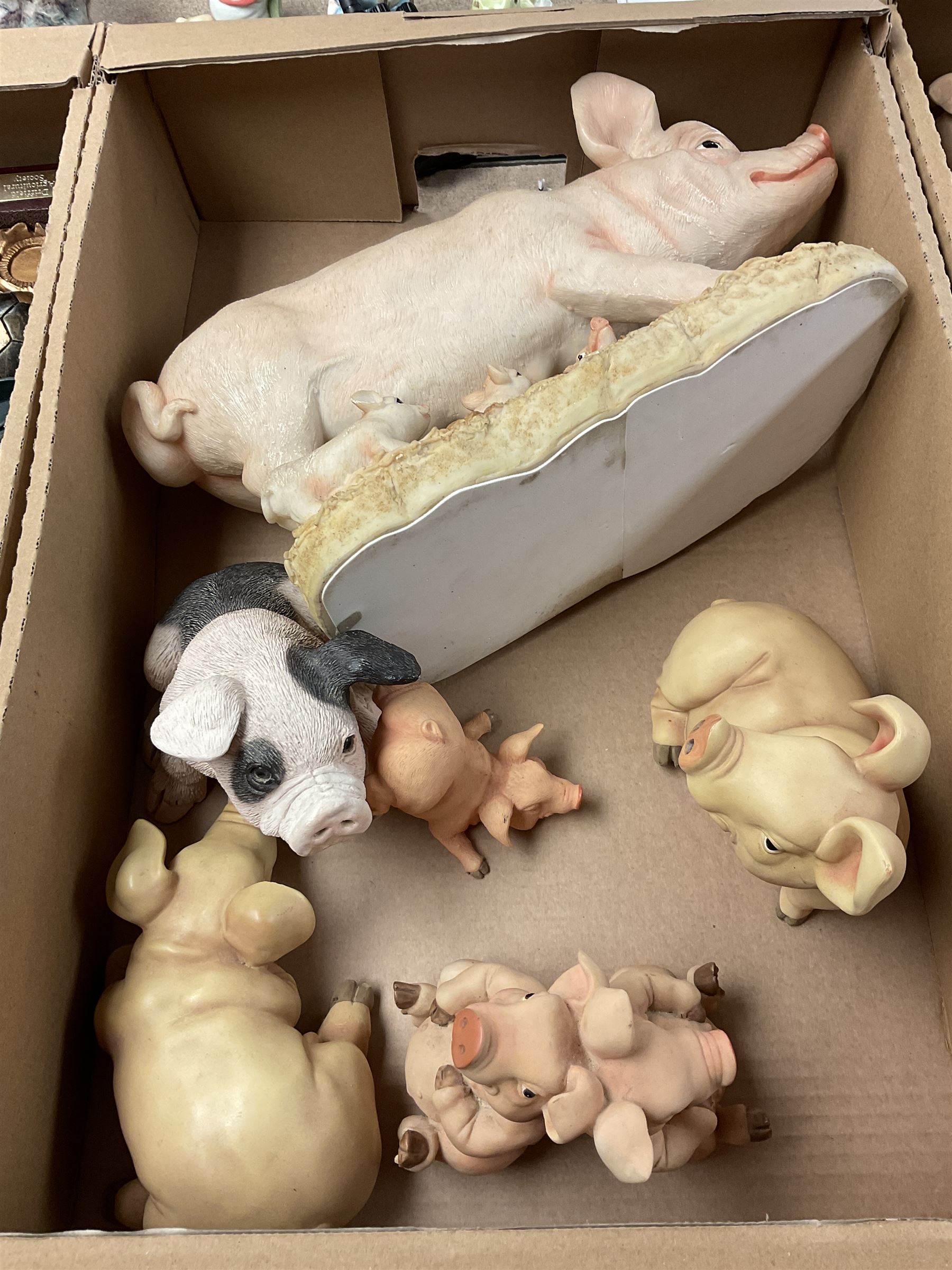 Collection of model pigs, Staffordshire Woodland Collection figures, trophies etc in three boxes