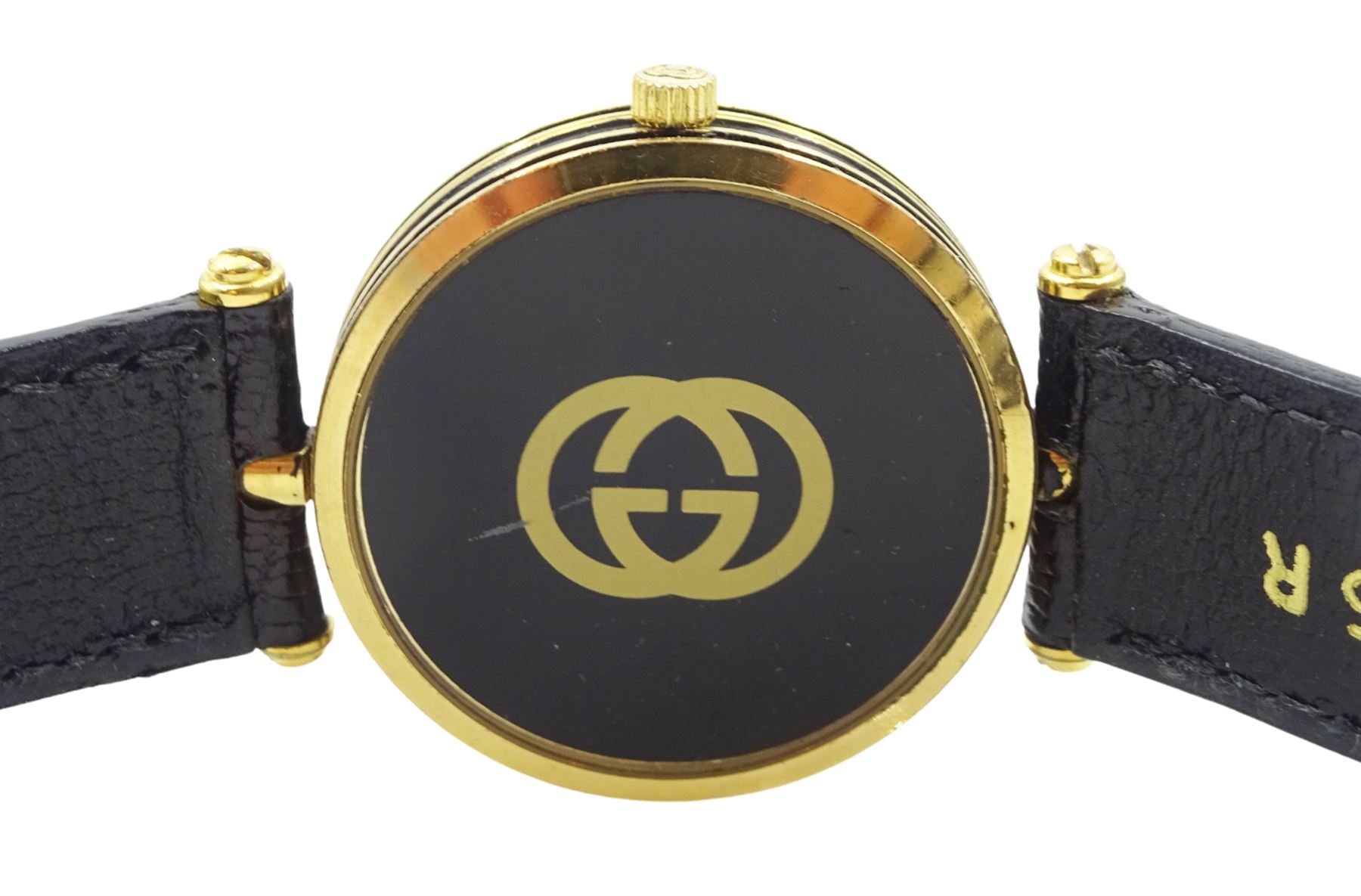 Gucci Shelly Line quartz wristwatch, gilt dial with GG logo back case, boxed