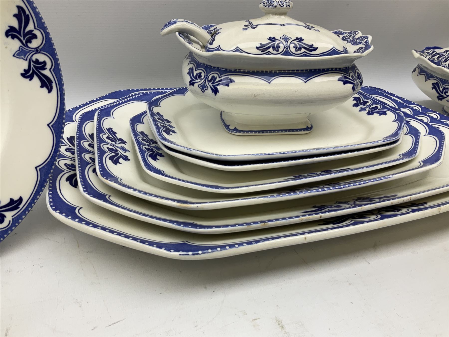 Burgess and Leigh Middleport pottery dinner wares decorated in the ‘Milford’ pattern, to include lidded tureens, graduated meat plates, dinner plates etc 