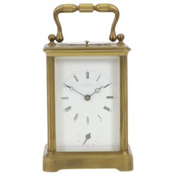French- late 19th century 8-day  twin train corniche carriage clock with hour repeat and alarm, four bevelled glass panels and oval inset viewing glass to the top, enamel dial with Roman numerals, minute markers and fine moon hands, with alarm setting dial and indistinct London retailers name, movement with original jewelled and silvered lever platform escapement and rack striking, sounding the hours and alarm on a single rear mounted bell. With key.