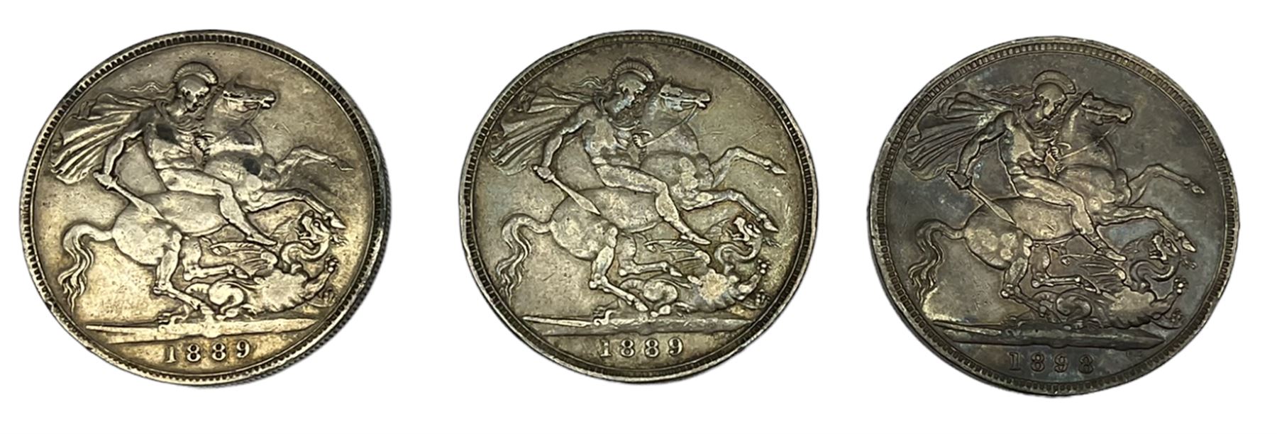 Three Queen Victoria crown coins, dated 1898 and two 1889