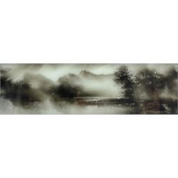 Maurice William Crawshaw (British 1947-): Lakeland Landscape, candle smoke picture signed and dated '93, 10cm x 31cm