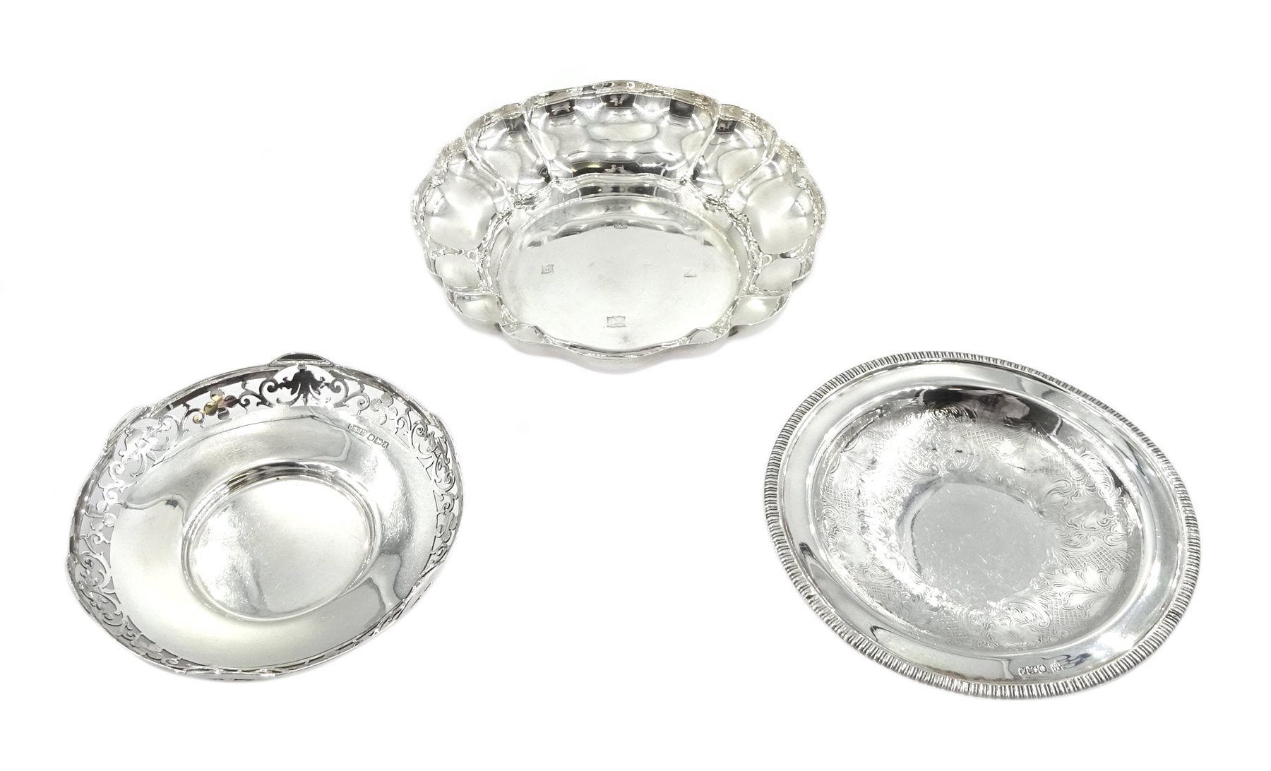 Silver dish by Barker Ellis Silver Co, Birmingham 1974, silver pedestal dish by E H P Co Ltd, Sheffield 1975 and one other, approx 14.2oz
