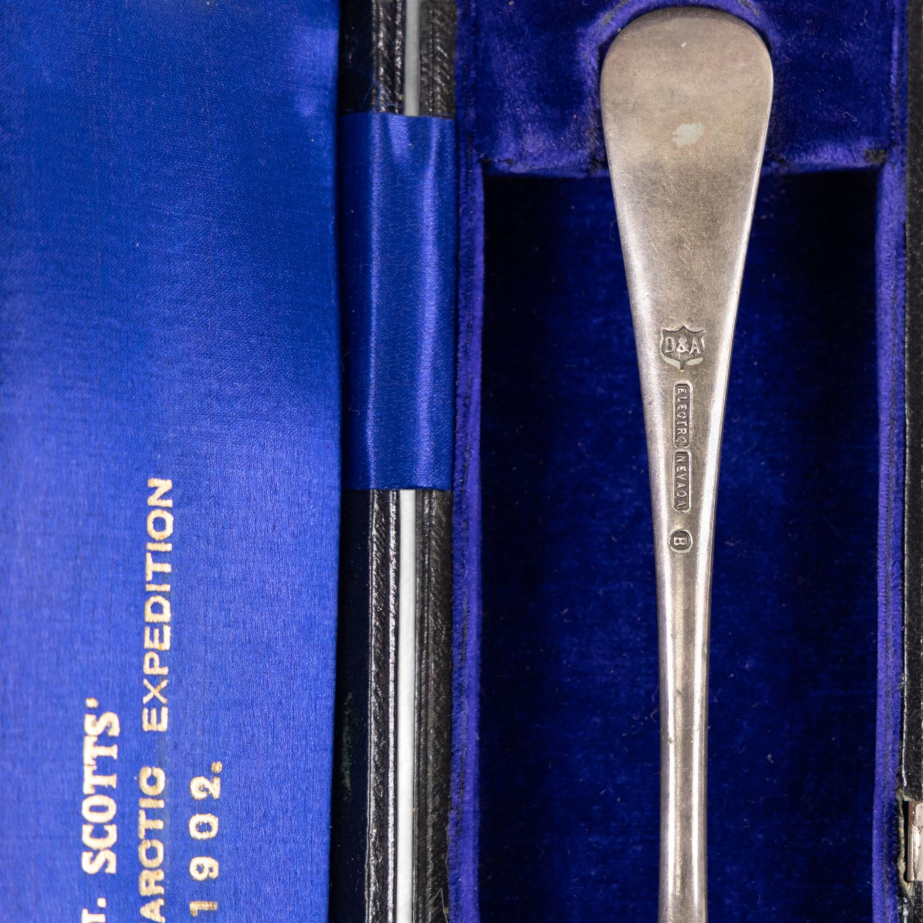 Capt Scotts' British National Antarctic Expedition 1901-1904: table fork from relief ship SY Morning, an electroplated nickel silver table fork, engraved with circular crest reading 'National Antarctic Expedition SY Morning', the fork with maker's mark for Daniel and Arter Ltd, Birmingham, stamped with trade name 'Nevada Silver', in tooled leather case impressed with gilt initials 'AMHC', with blue silk and velvet interior, the gilt lettering to interior reading 'Capt Scotts' British Antarctic Expedition'

Notes: The SY Morning was a steam yacht that served as a relief and resupply vessel for Captain Scott's Discovery during the British National Antarctic Expedition 1901-1904