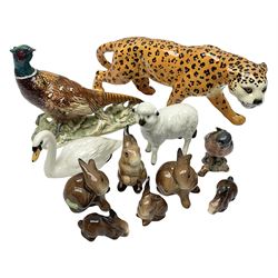 Group of Beswick figures to include leopard no 1082, rabbits, swan, pheasant no 1226 etc, all with marks beneath