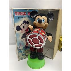 Mickey Mouse Trick Star battery operated drummer figure; Illco Mickey Mouse battery operated Fun Castle Roller Coaster; battery operated Western Express Locomotive; and JK Wells Fargo Overland Stage scale model; all boxed (4)