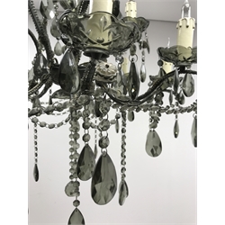  Large twelve light glass chandelier, baluster shaped central glass column supporting four short arms above a second tier of eight arms, each fitted with a candle effect bulb holder and grey glass drops, H78cm  